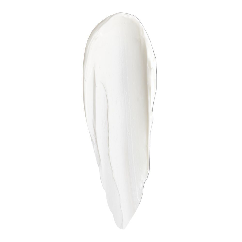 Un singolo tocco di crema viso KORFF Lifting bianca su sfondo bianco.