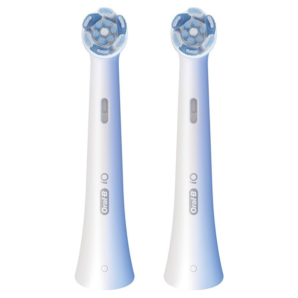 Due testine Oral-B iO bianche con setole blu. Per spazzolini elettrici.