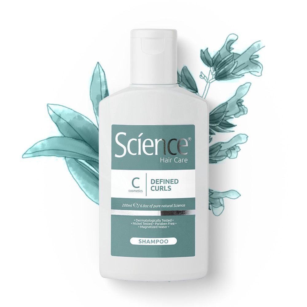 Flacone di Science Hair Care Shampoo Ricci Definiti con elementi botanici.