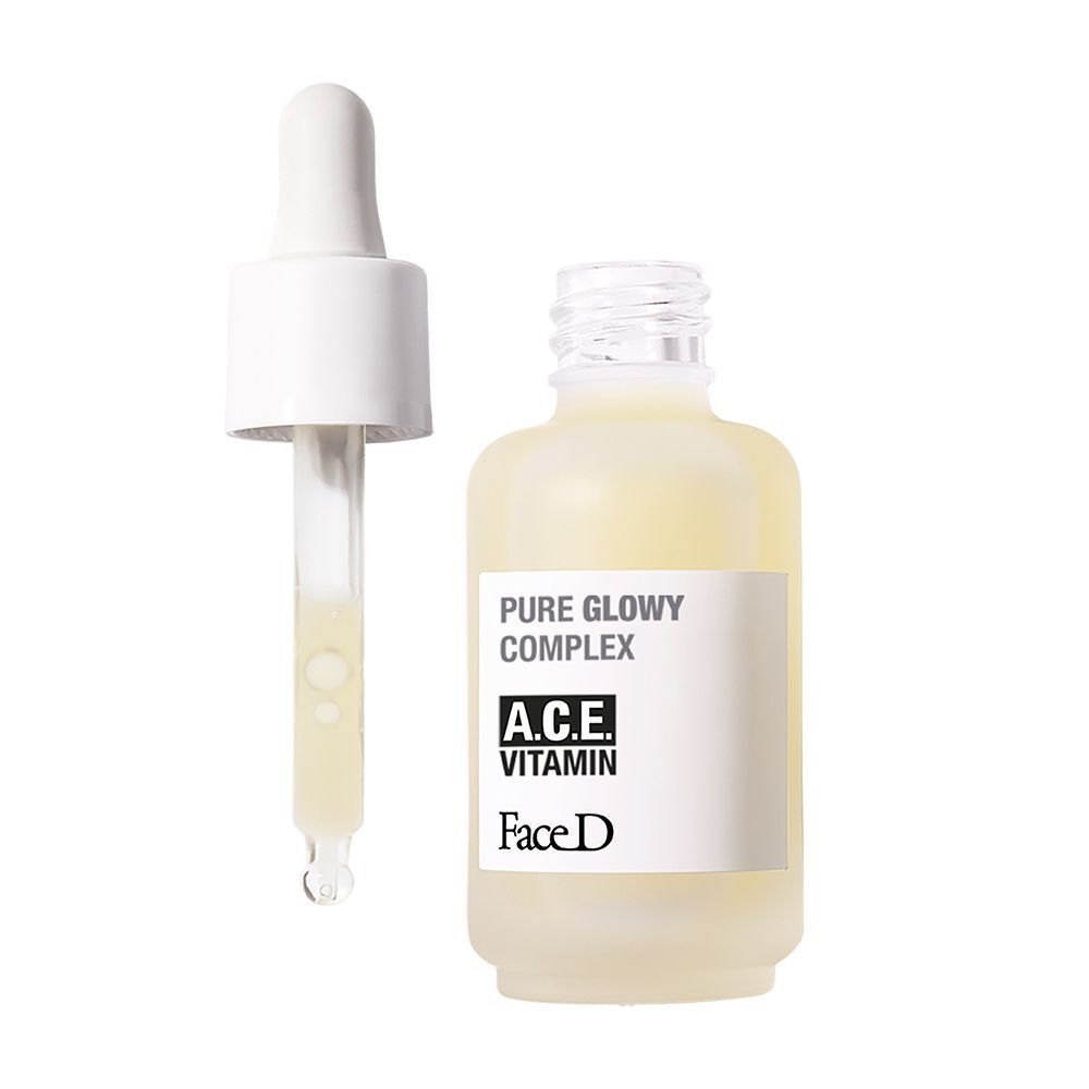 Flacone Face D Pure Glowy Complex Vitamine A.C.E. con contagocce contenente liquido.