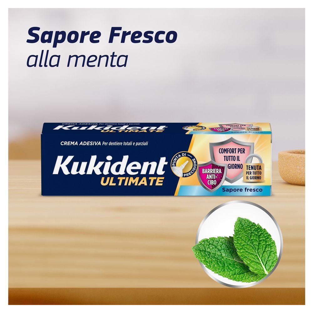 Crema adesiva Kukident Ultimate, 40g, al gusto di menta con foglie di menta.