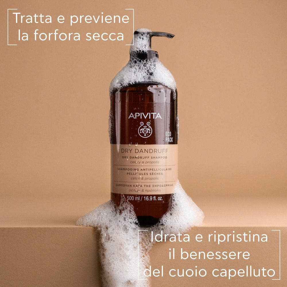 Shampoo APIVITA per forfora secca con schiuma.