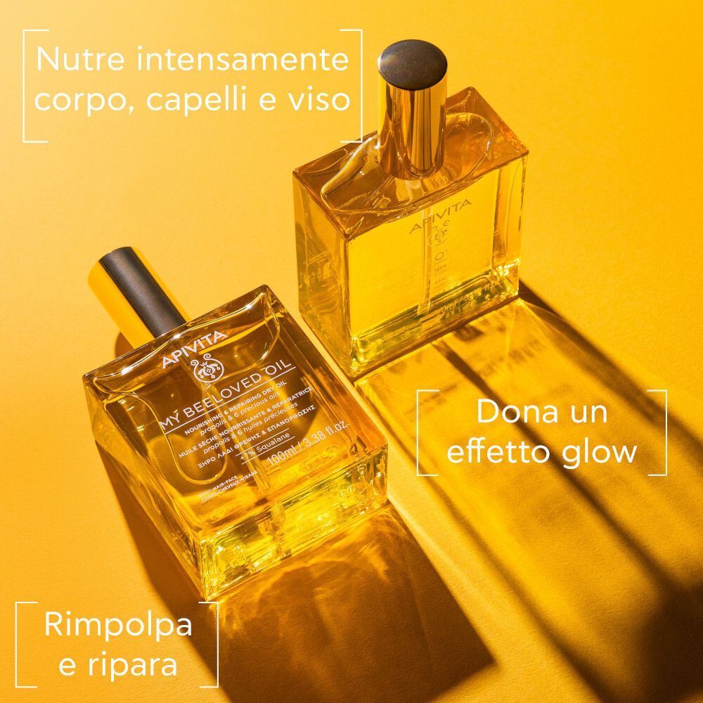 Due flaconi di APIVITA My Beeloved Oil su sfondo giallo. Testo: Nutre intensamente corpo, capelli e viso. Dona un effetto glow. Rimpolpa e ripara.