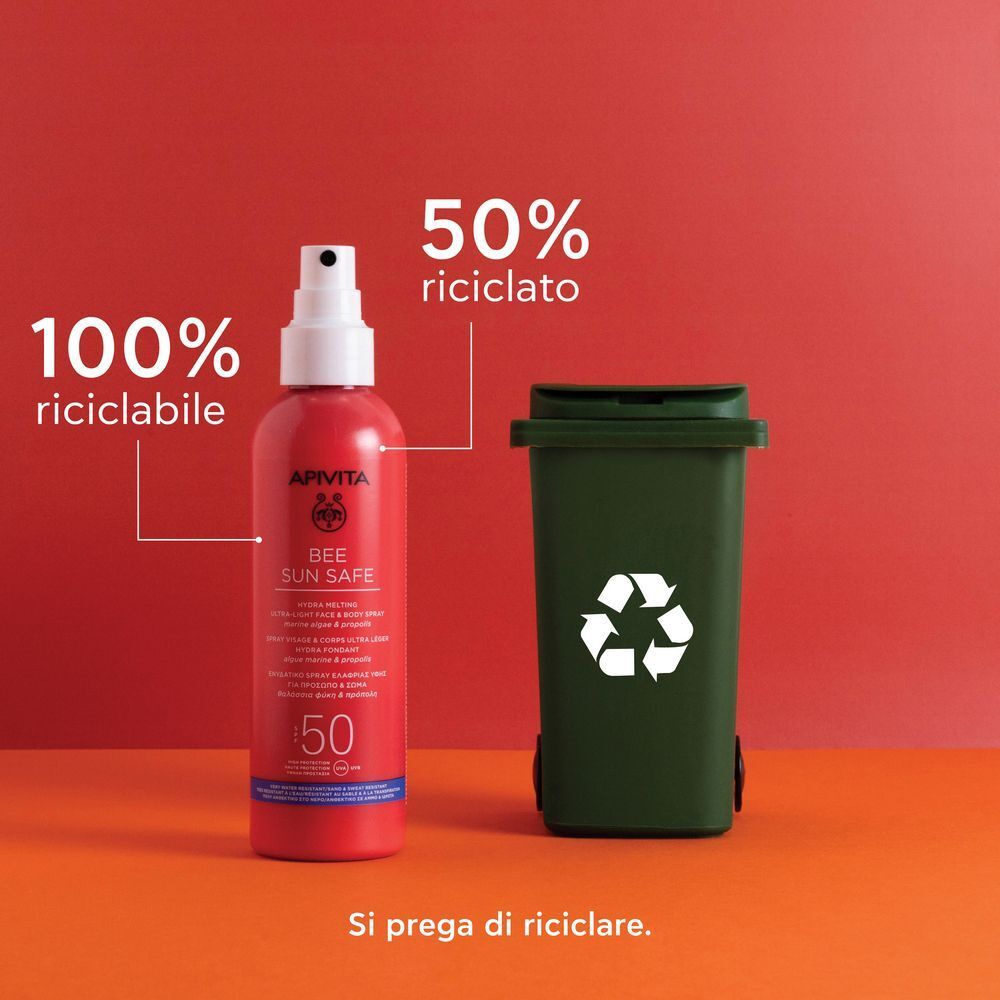 Flacone spray rosso APIVITA SPF 50, estratto di propoli incapsulato.
