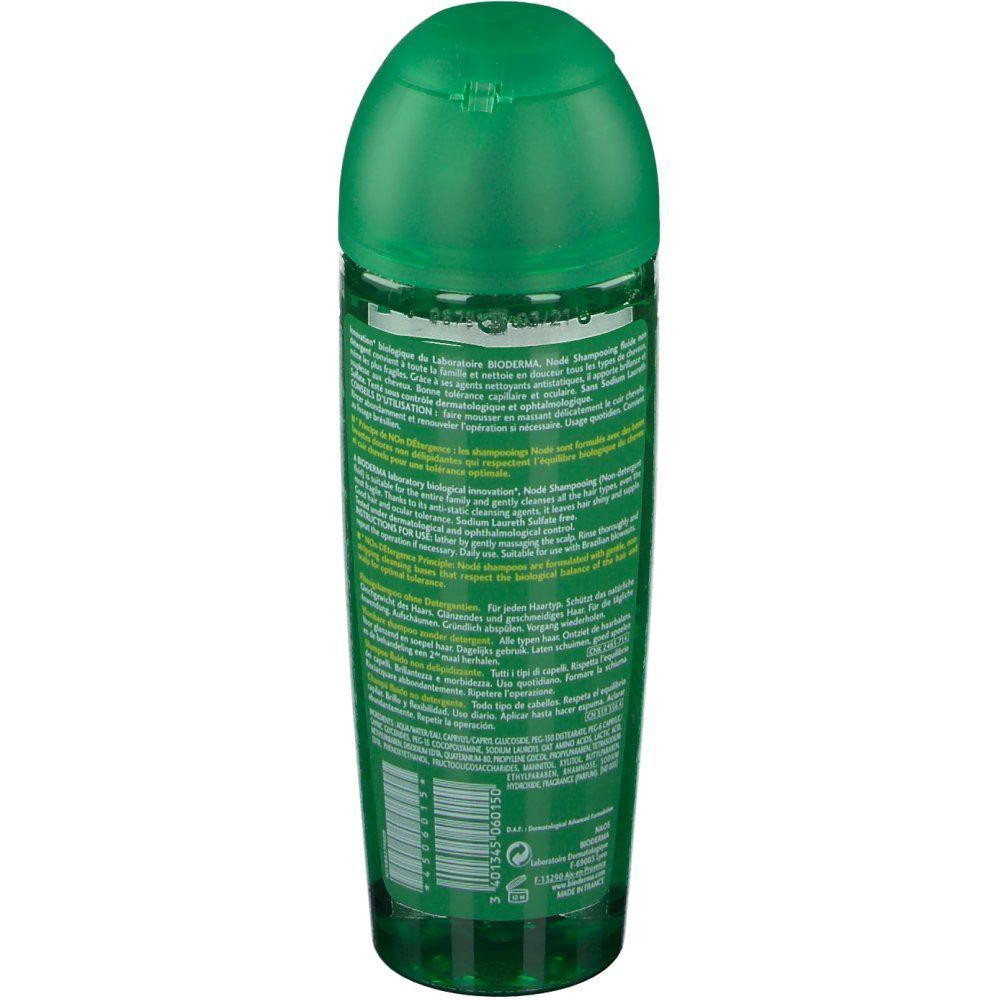 Flacone di shampoo BIODERMA Nodé Fluide verde, vista posteriore con testo.