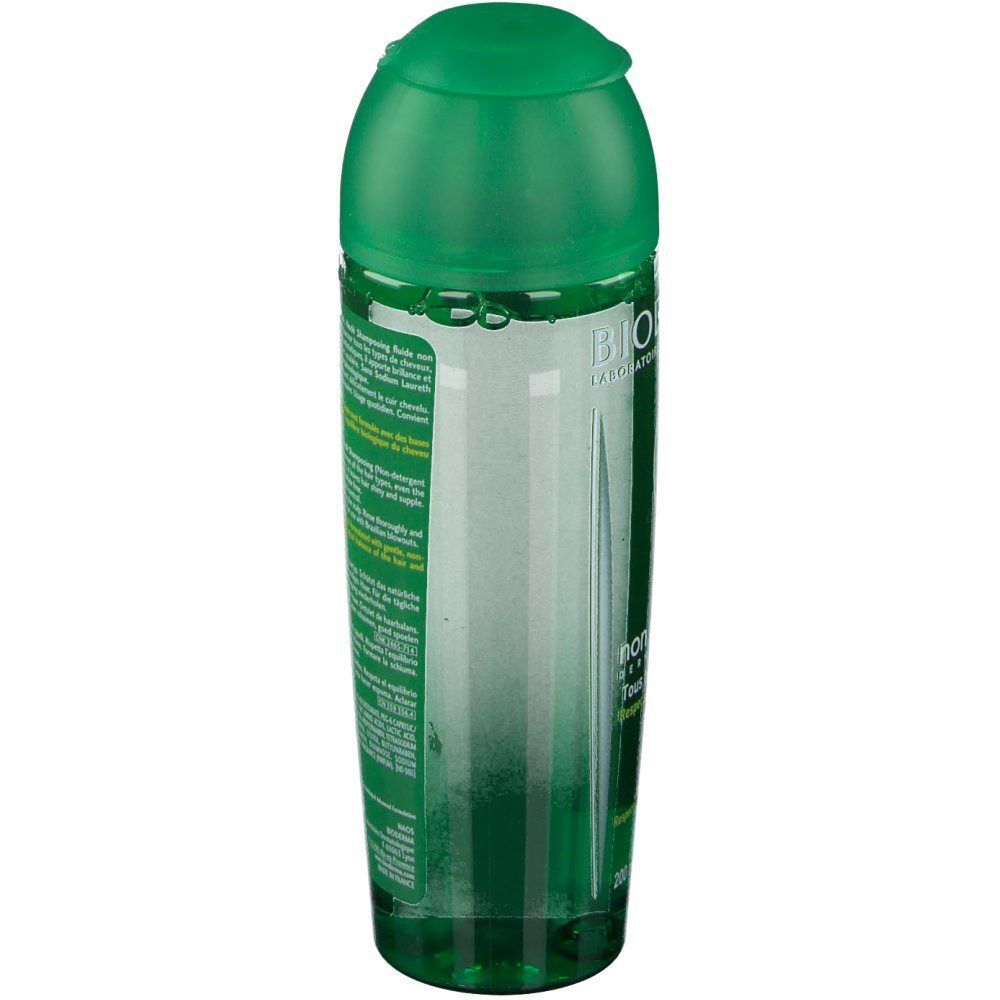 Flacone di shampoo BIODERMA Nodé Fluide verde, vista posteriore con testo.