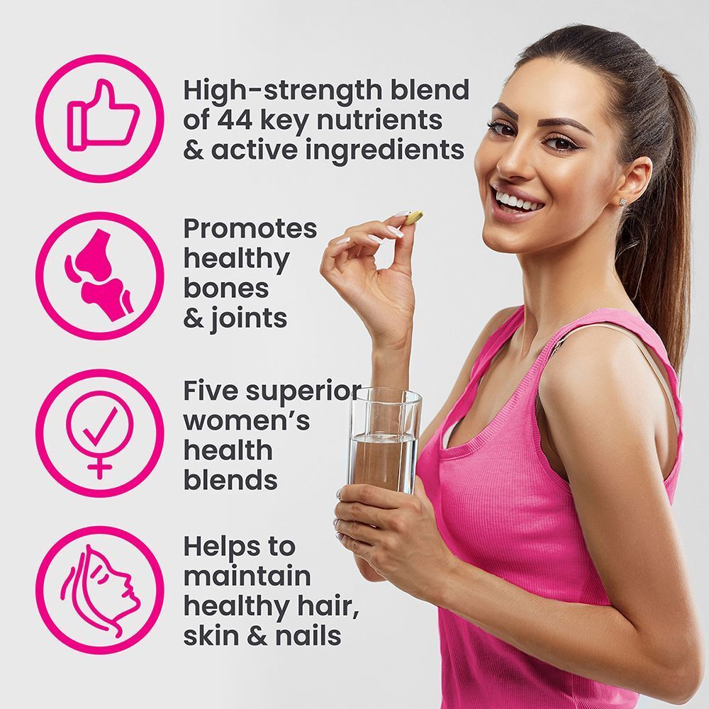 Donna tiene una capsula di VPLAB Ultra Women's Multivitamin Formula, con icone per ossa, capelli, pelle e unghie.
