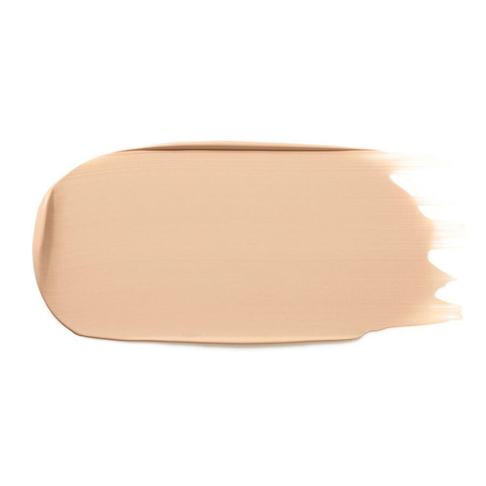 Una swatch di fondotinta Dr. Hauschka Macadamia 01 in beige chiaro.