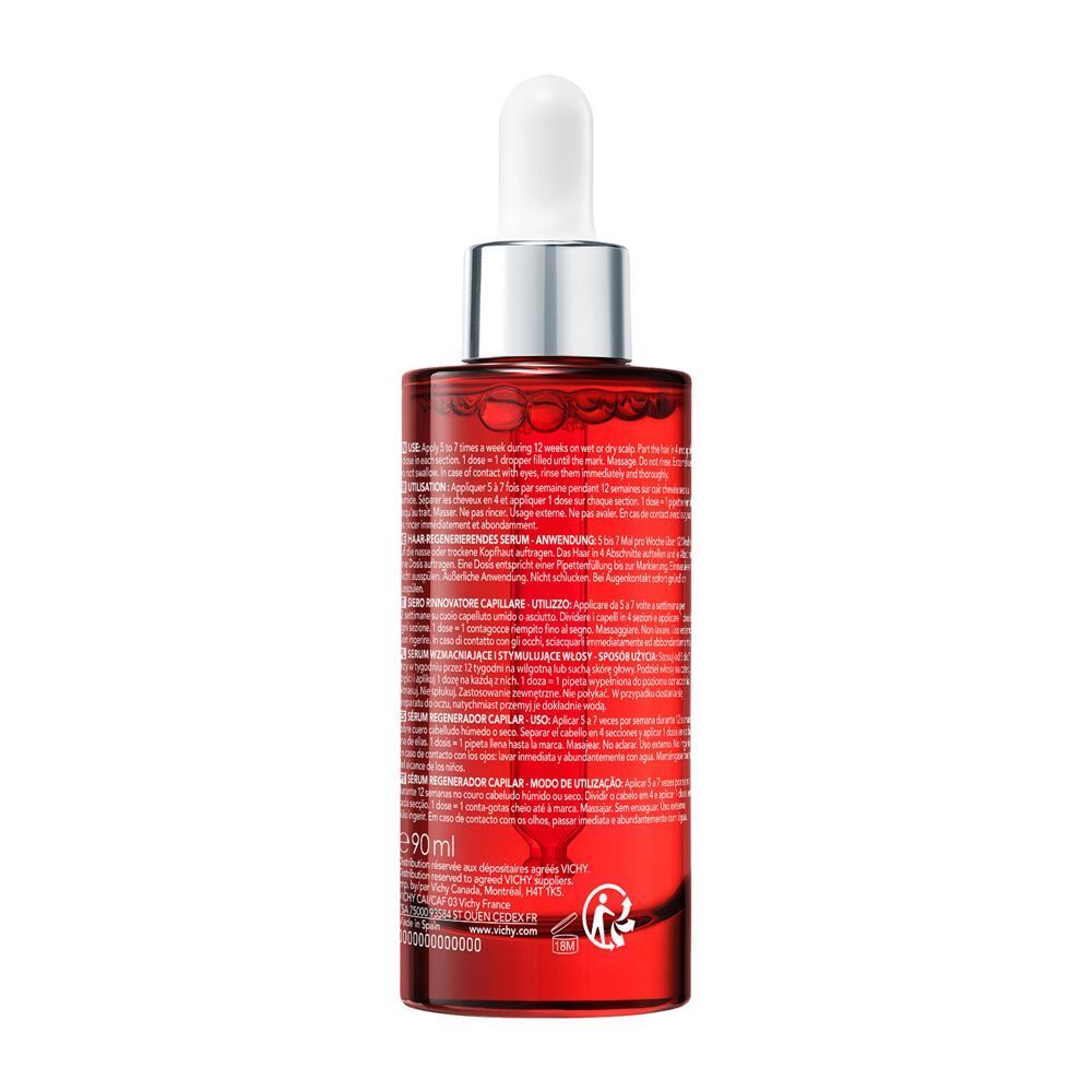 Retro di un flacone Vichy Dercos Aminexil con istruzioni dettagliate.