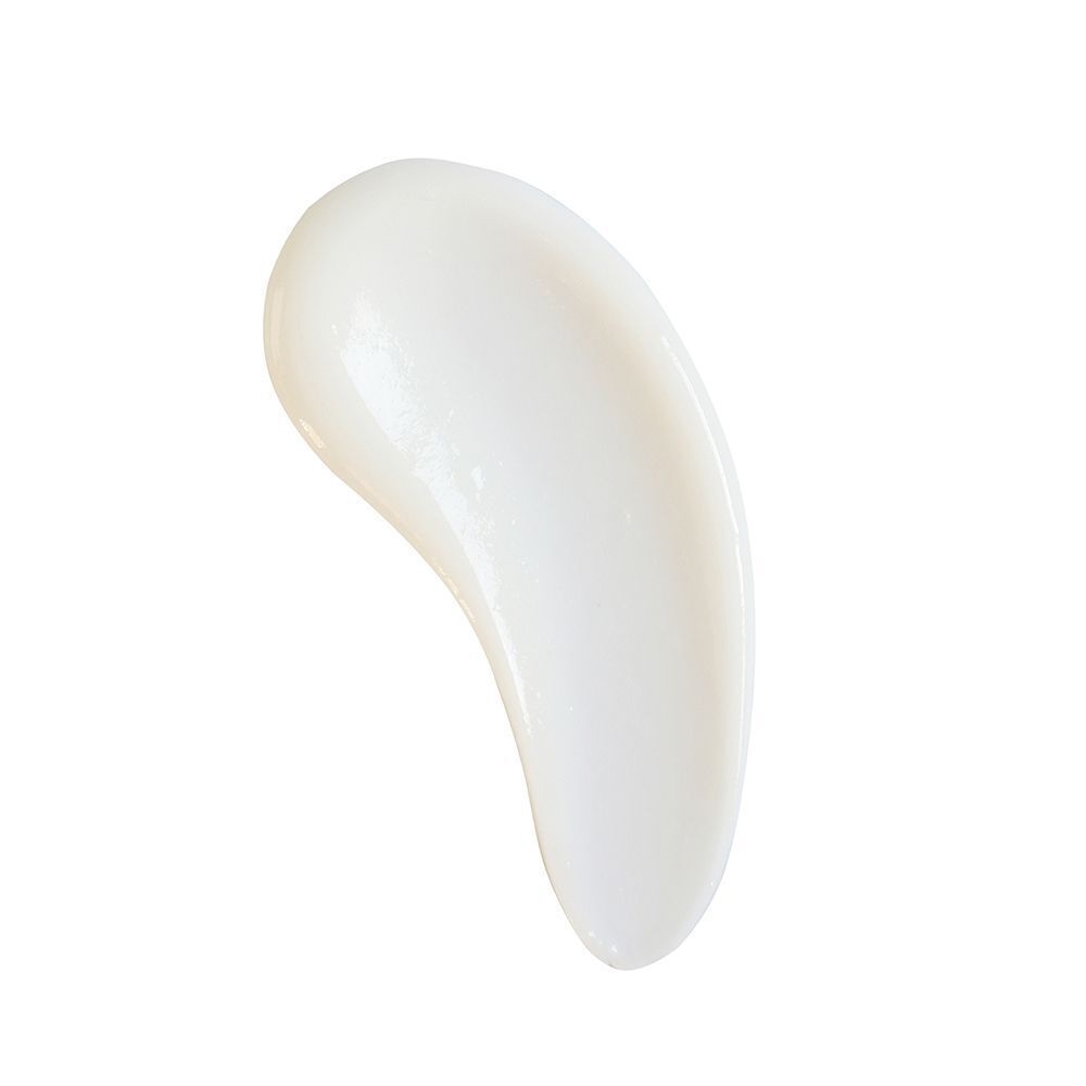 Una scia di crema bianca su sfondo bianco.