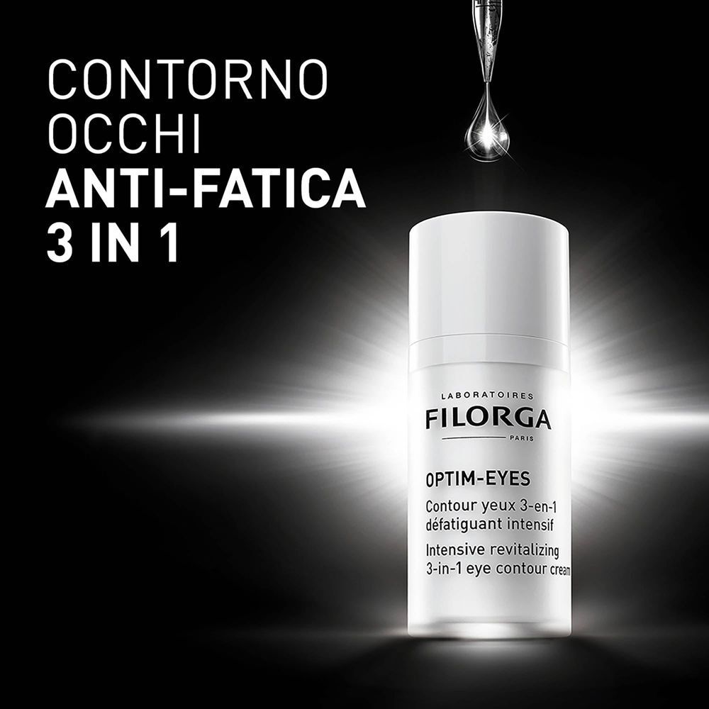 Contorno occhi anti-fatica 3 in 1 Filorga Optim-Eyes con una goccia sopra.