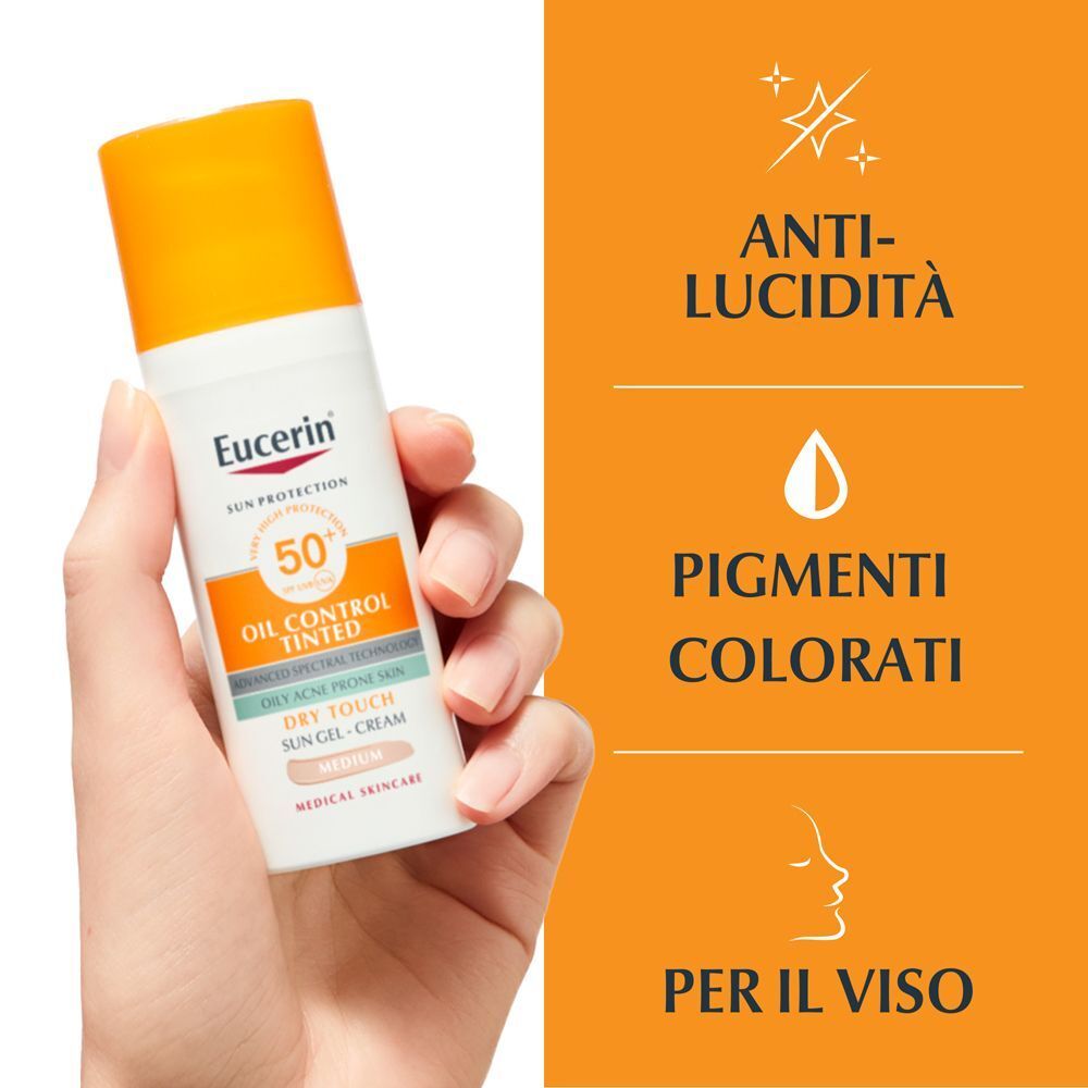 Mano con Eucerin Oil Control Tinted, con anti-lucidità, pigmenti colorati e per il viso.