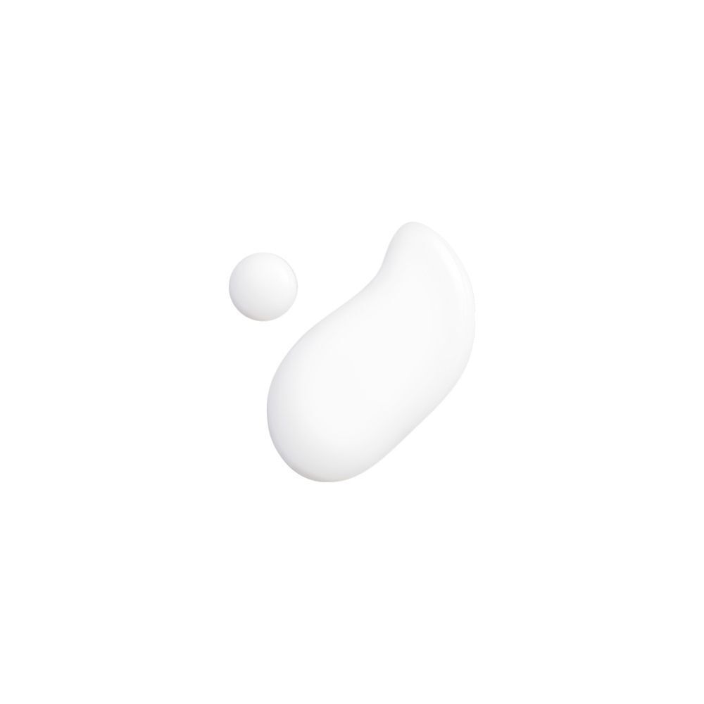 Una goccia e una piccola quantità di liquido bianco su sfondo bianco.