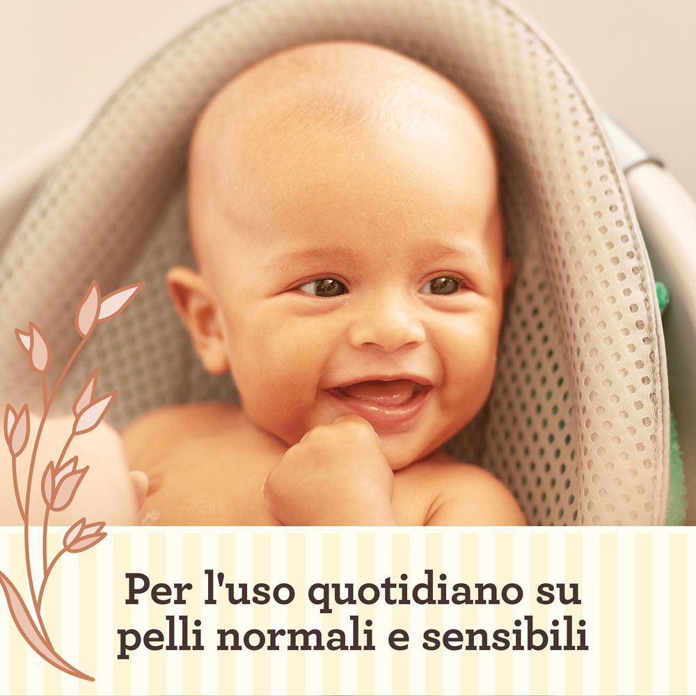 Bambino sorridente in vasca, testo: Per uso quotidiano su pelli normali e sensibili.
