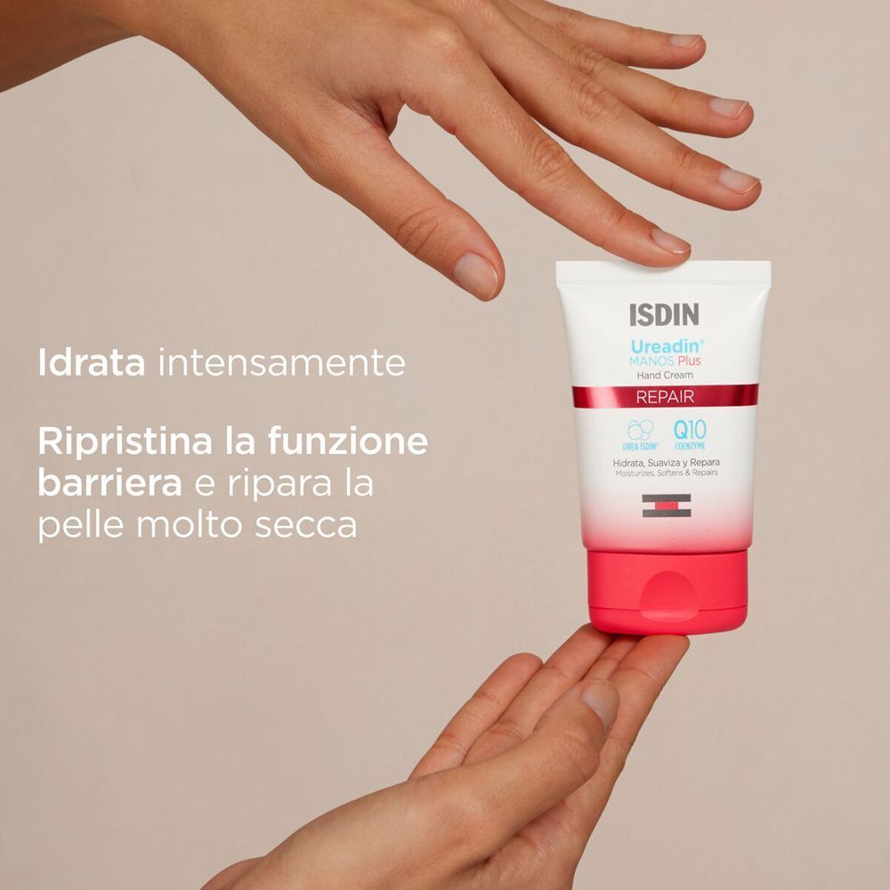 Tubetto di crema mani ISDIN Ureadin Repair in una mano, con testo.