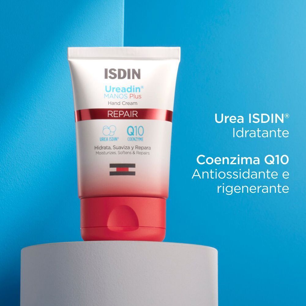 Tubetto di crema mani ISDIN Ureadin Repair su piedistallo, con testo.