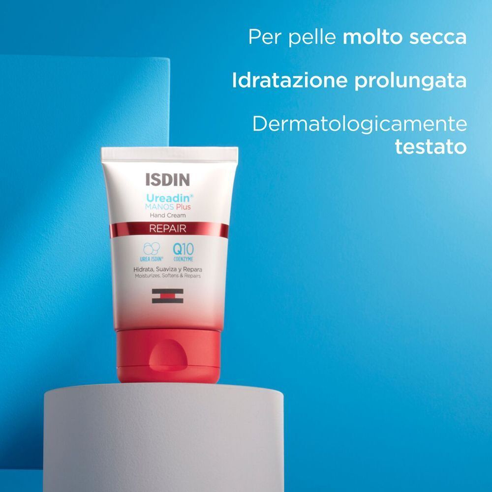 Tubetto di crema mani ISDIN Ureadin Repair su piedistallo, con testo.