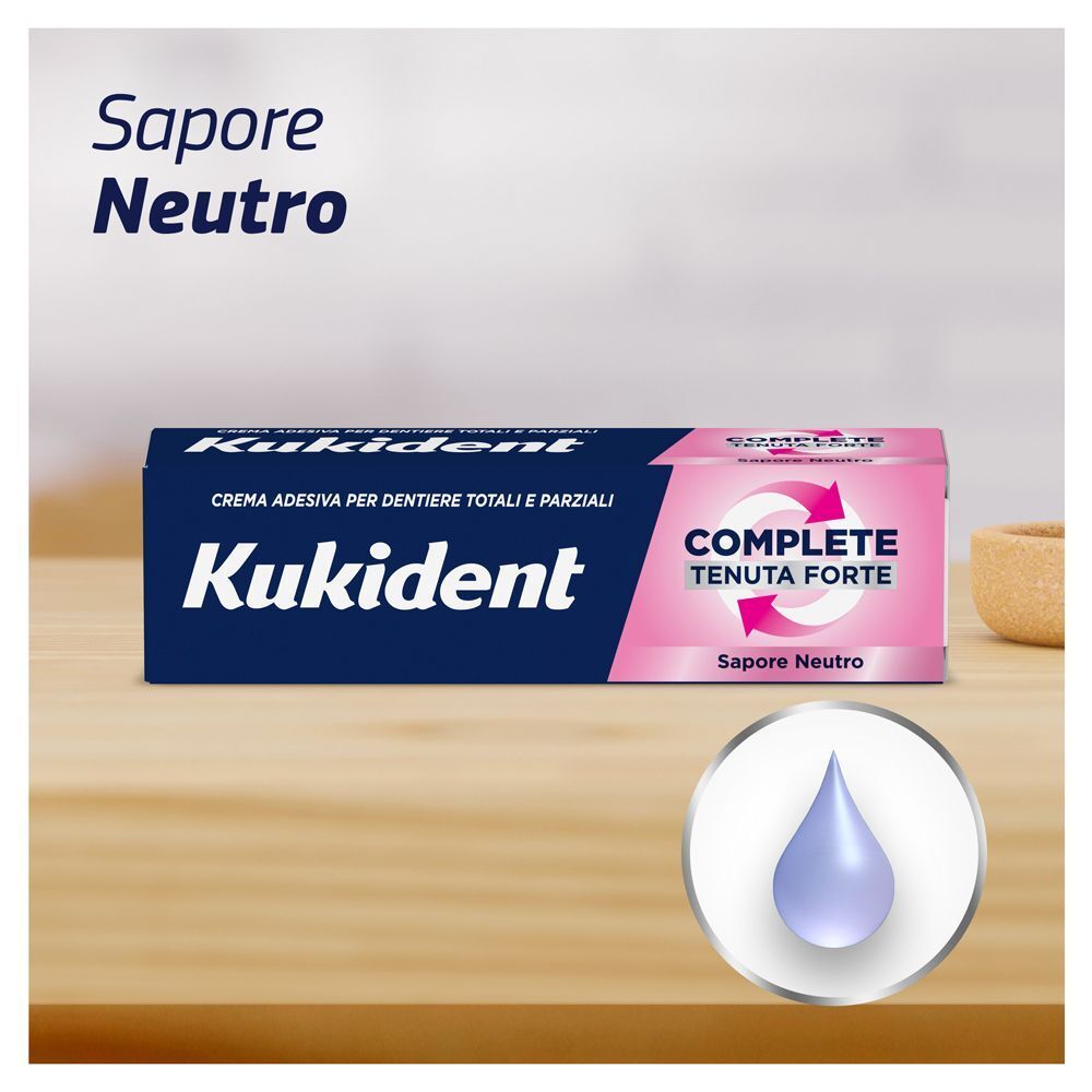 Confezione Kukident Complete Sapore Neutro con simbolo di goccia.