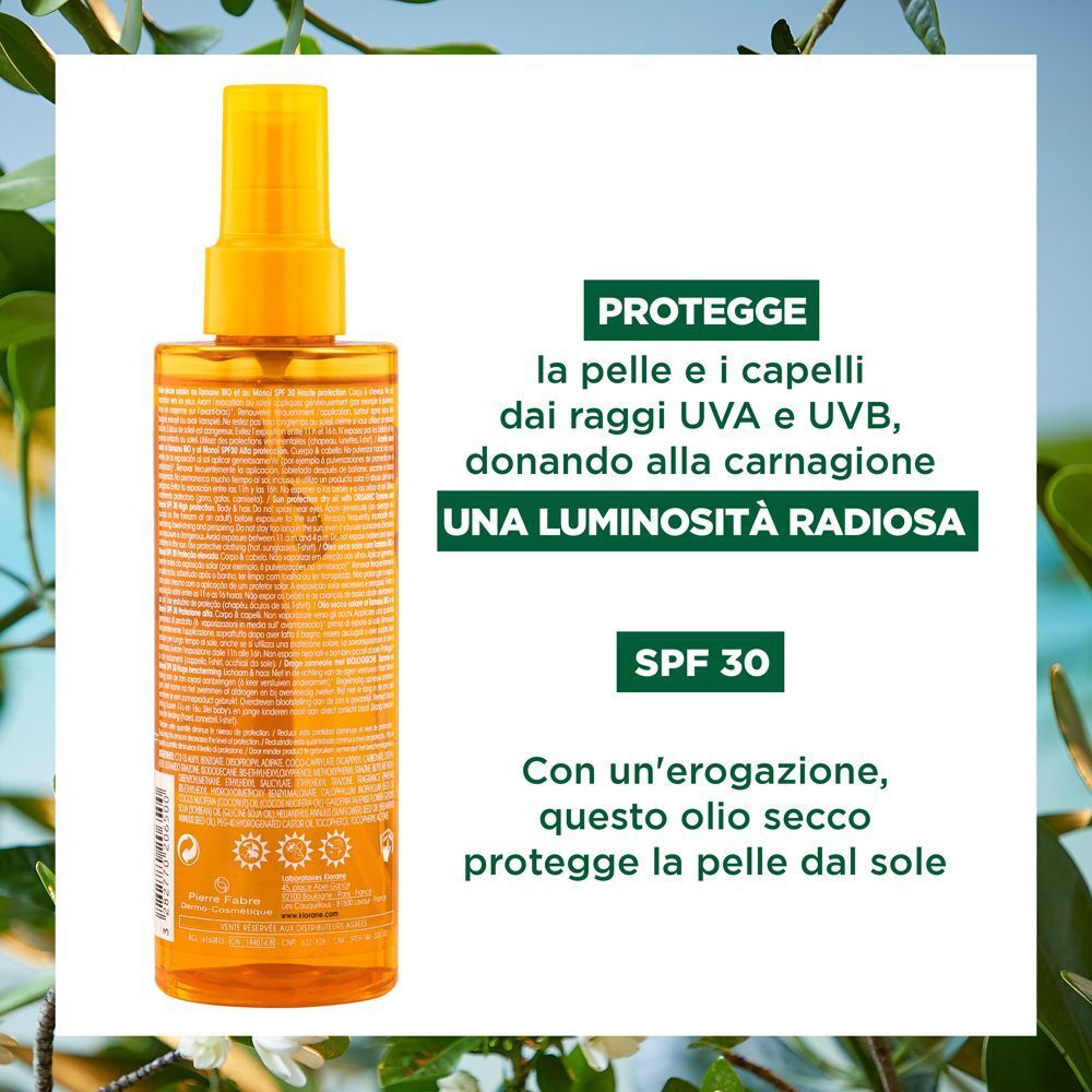 Retro di un flacone spray di olio solare Klorane SPF 30 con ingredienti.