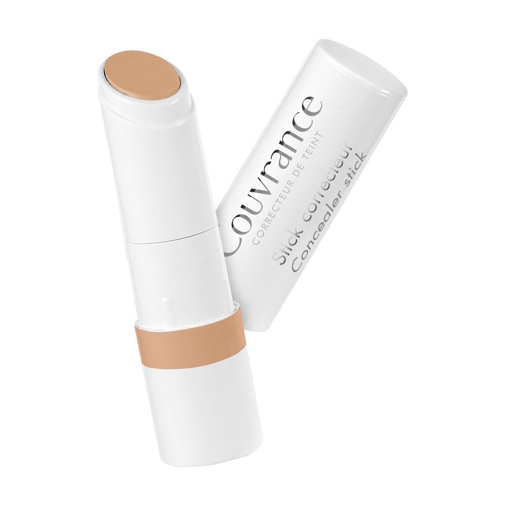 Uno stick correttore Eau Thermale Avène Couvrance Corallo SPF 30, aperto, prodotto visibile.