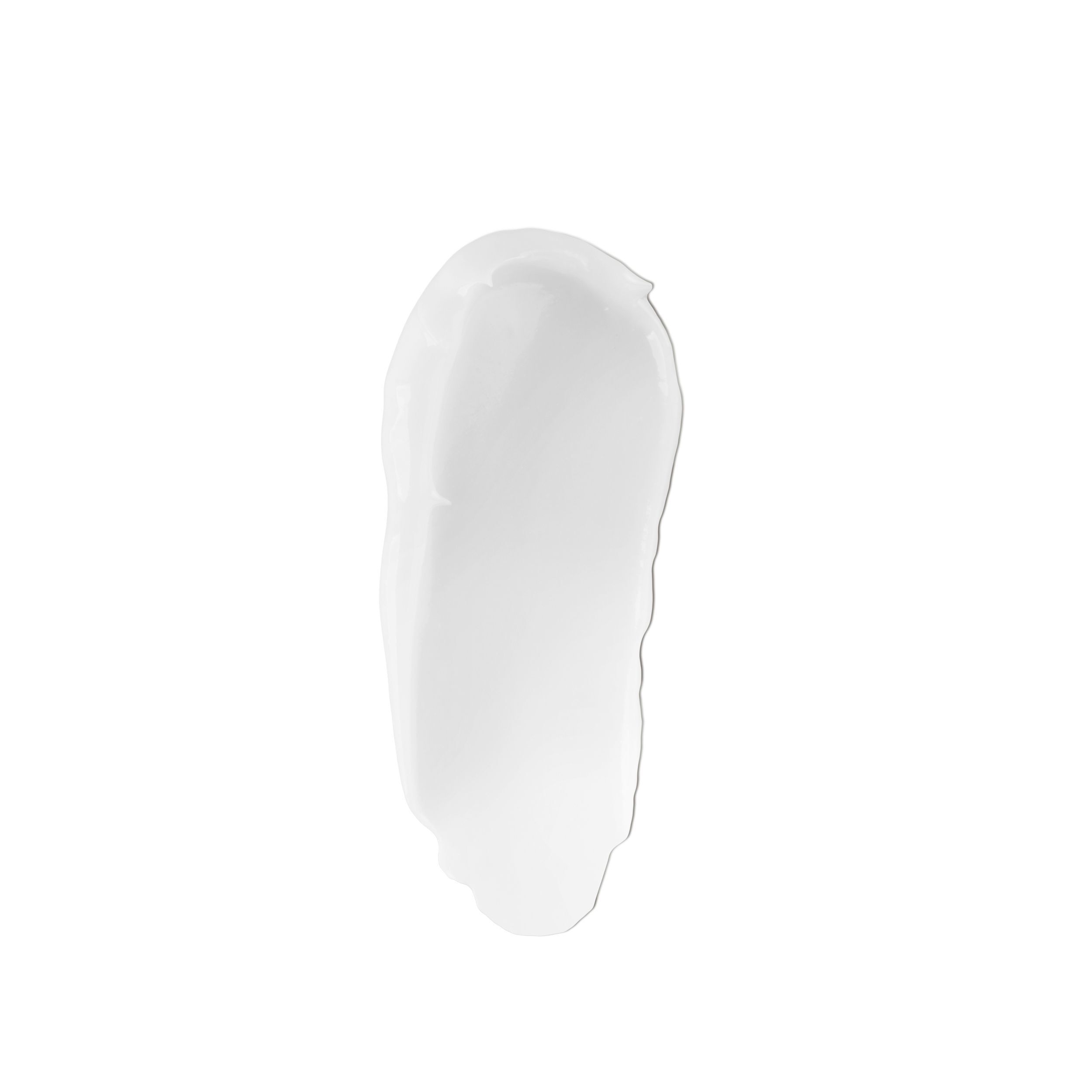 Una macchia di crema viso e collo KORFF 3D Sculpt bianca su sfondo bianco.