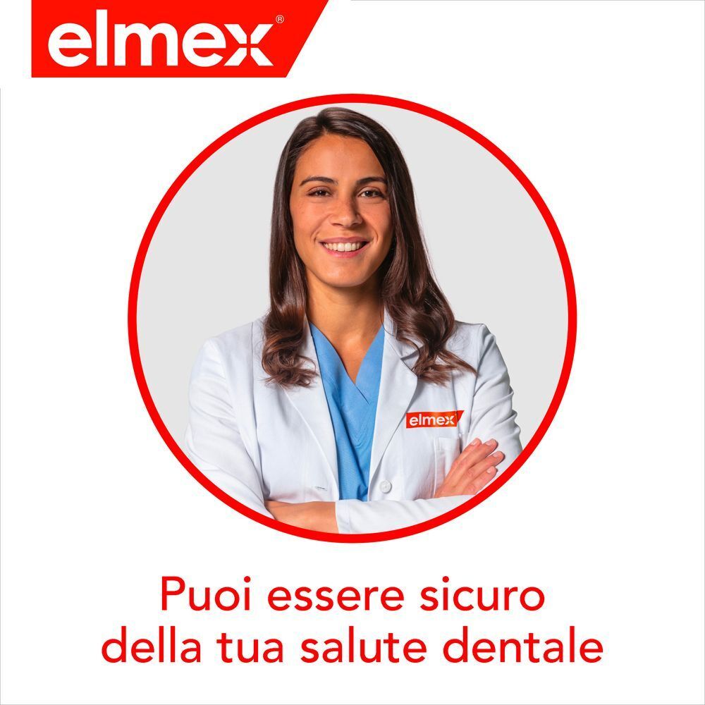 Dentista in camice bianco, che ispira fiducia nella salute dentale.