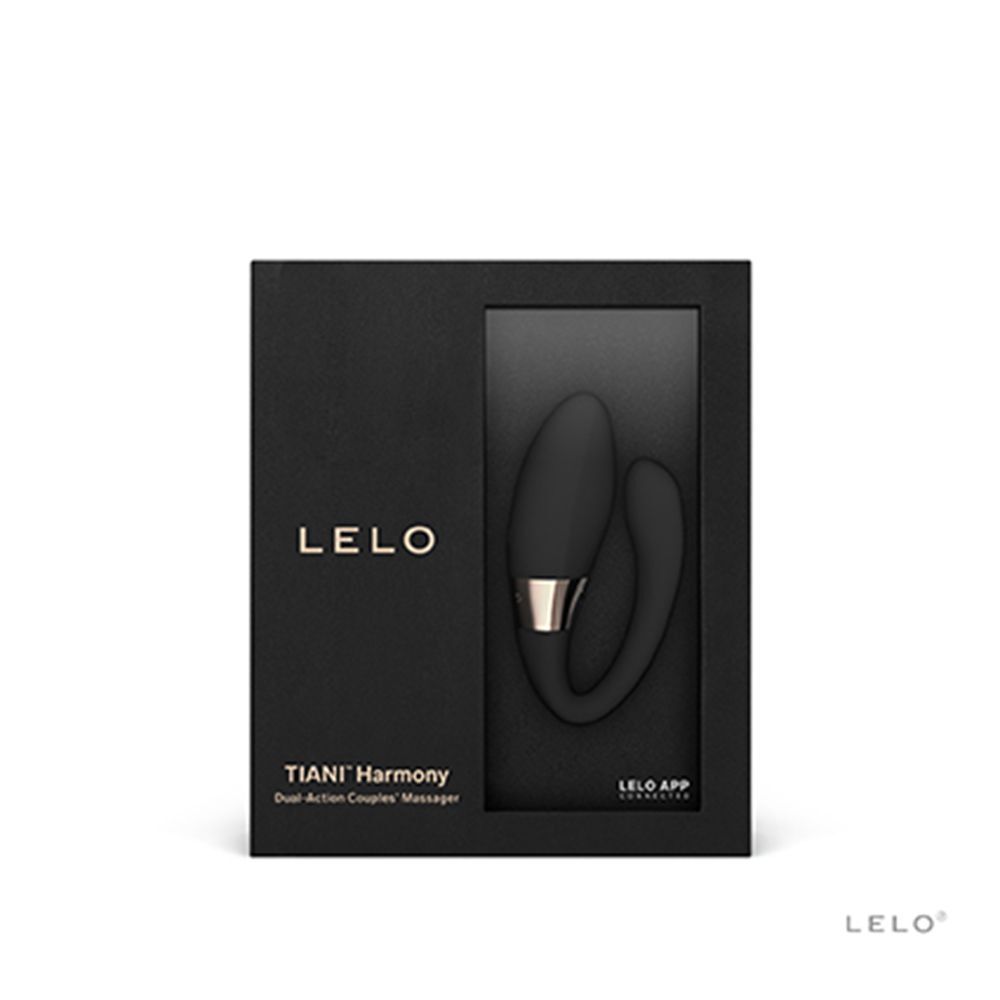 Vibratore nero a forma di U nella sua confezione Lelo nera aperta.