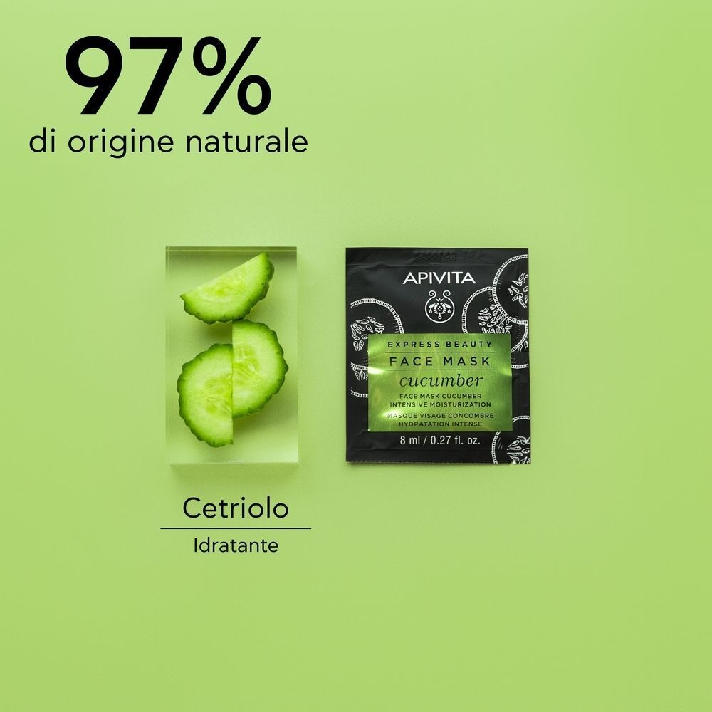 Maschera viso APIVITA Express Beauty al cetriolo, 8 ml, accanto a fette di cetriolo.