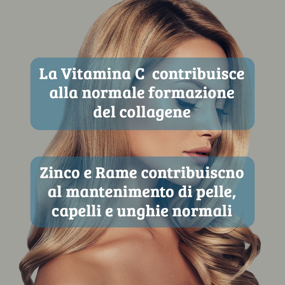 Donna con capelli lunghi, che evidenzia il ruolo di Vitamina C, Zinco e Rame per pelle, capelli e unghie.