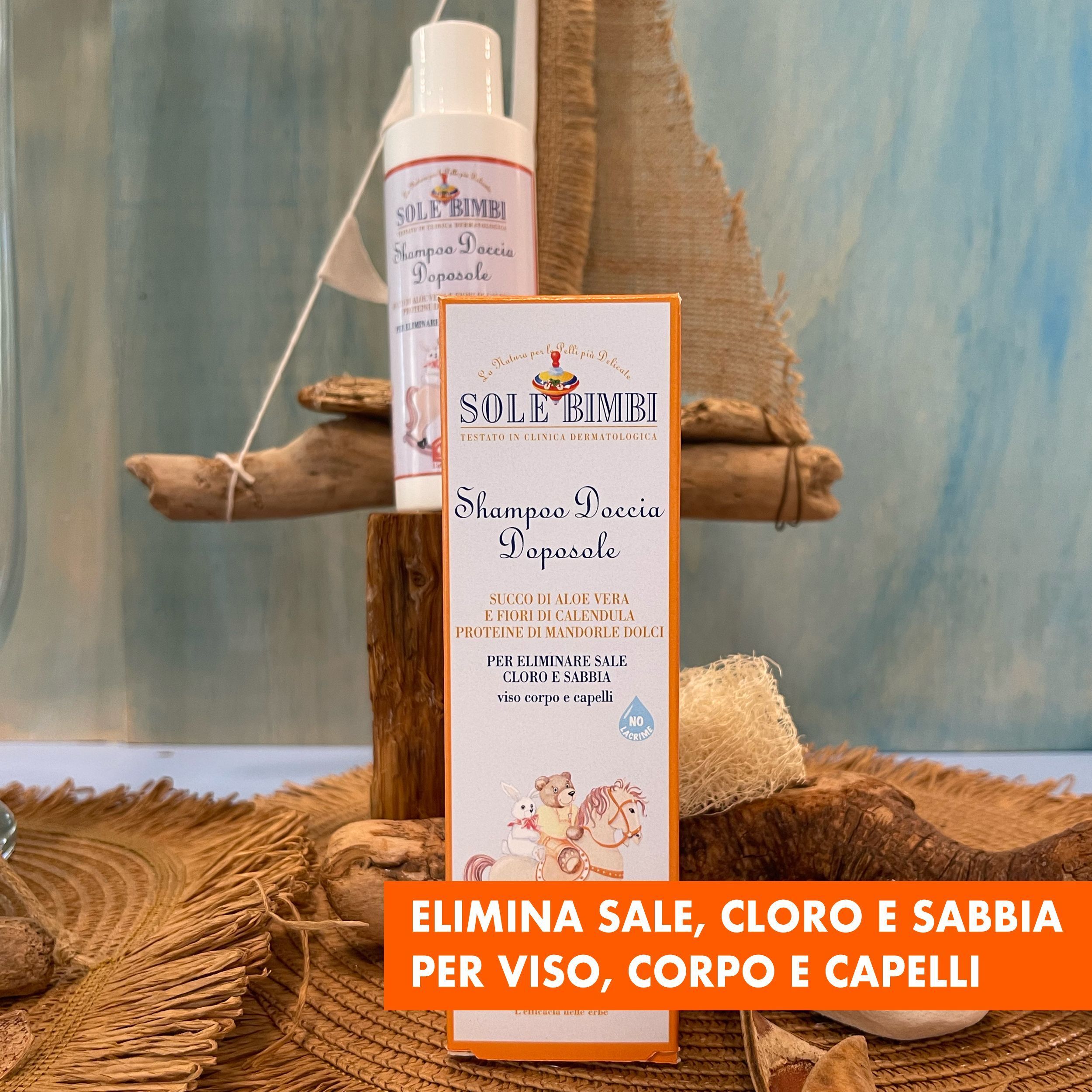 Flacone e scatola Helan SOLE BIMBI Shampoo Doccia Doposole su decorazione di legno galleggiante.