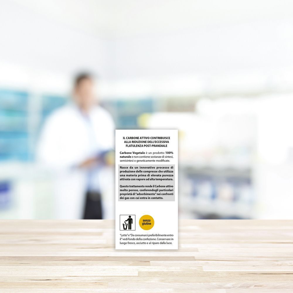 Retro di una confezione di Aboca Carbone Vegetale con informazioni su produzione e qualità.