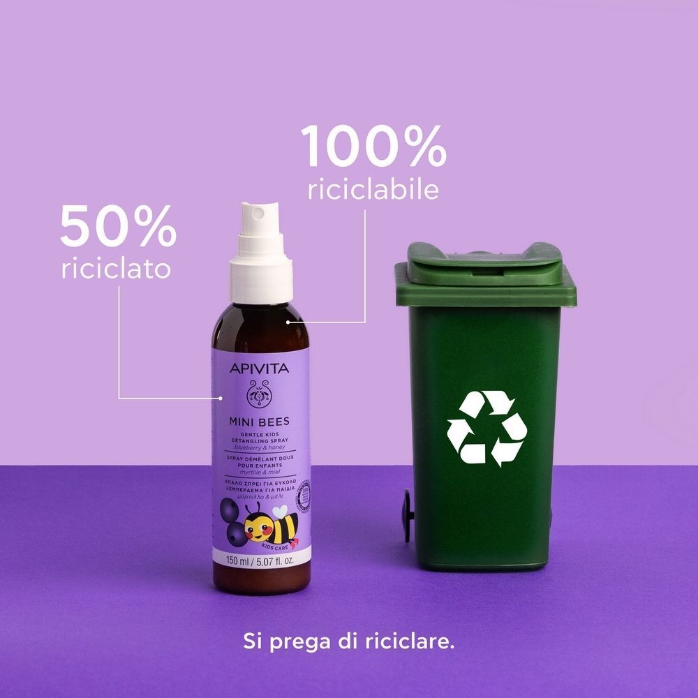 Spray Apivita Mini Bees accanto a un bidone della spazzatura.