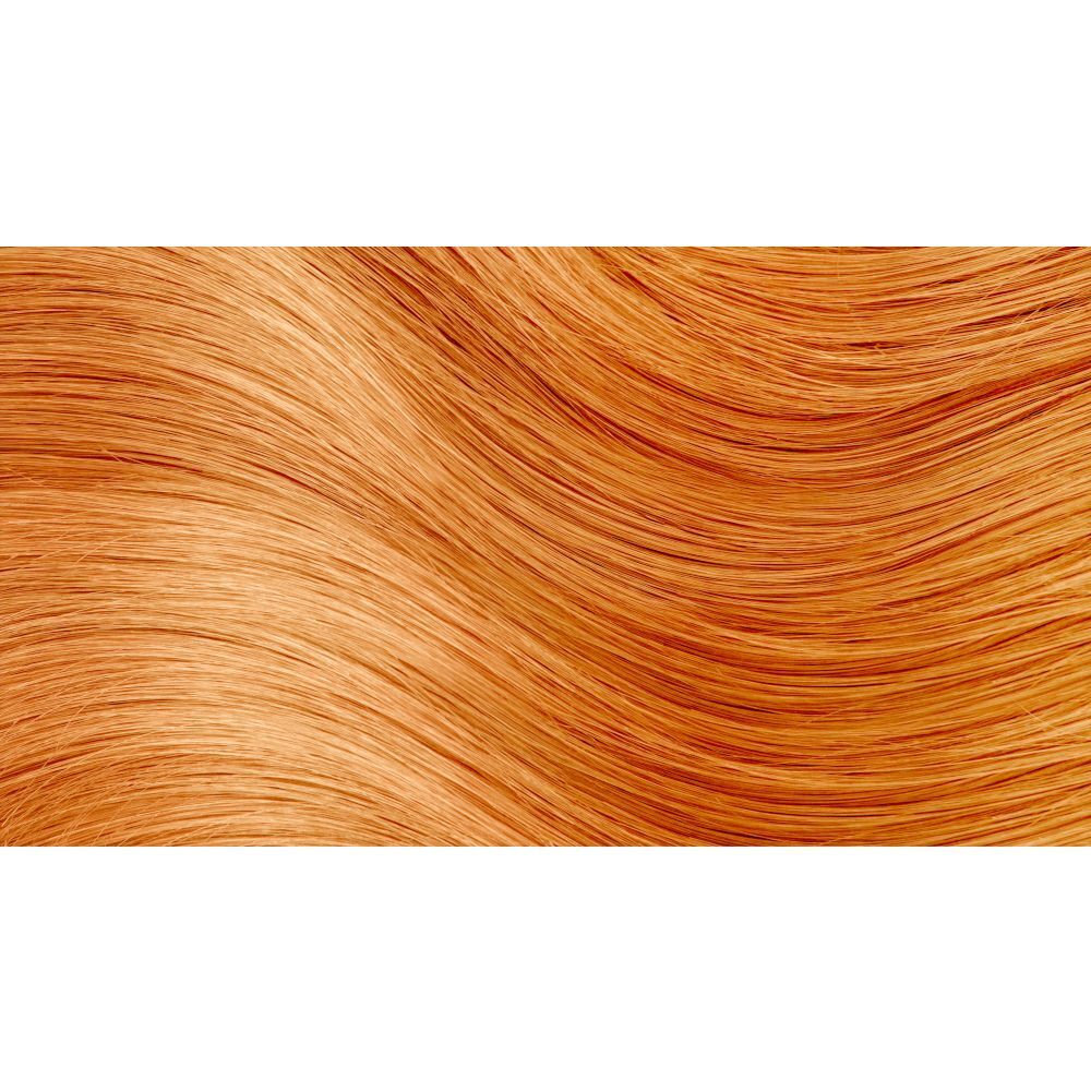 Primo piano di capelli arancioni, che mostrano il colore di HERBATINT® FF6 Orange.