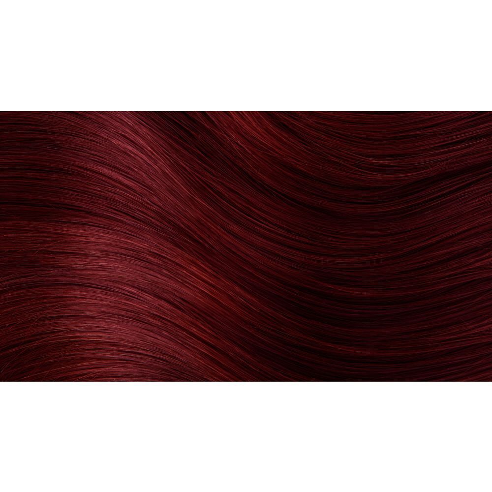 HERBATINT® FF1 Rosso Henne: Primo piano di capelli lunghi, mossi, rosso intenso.