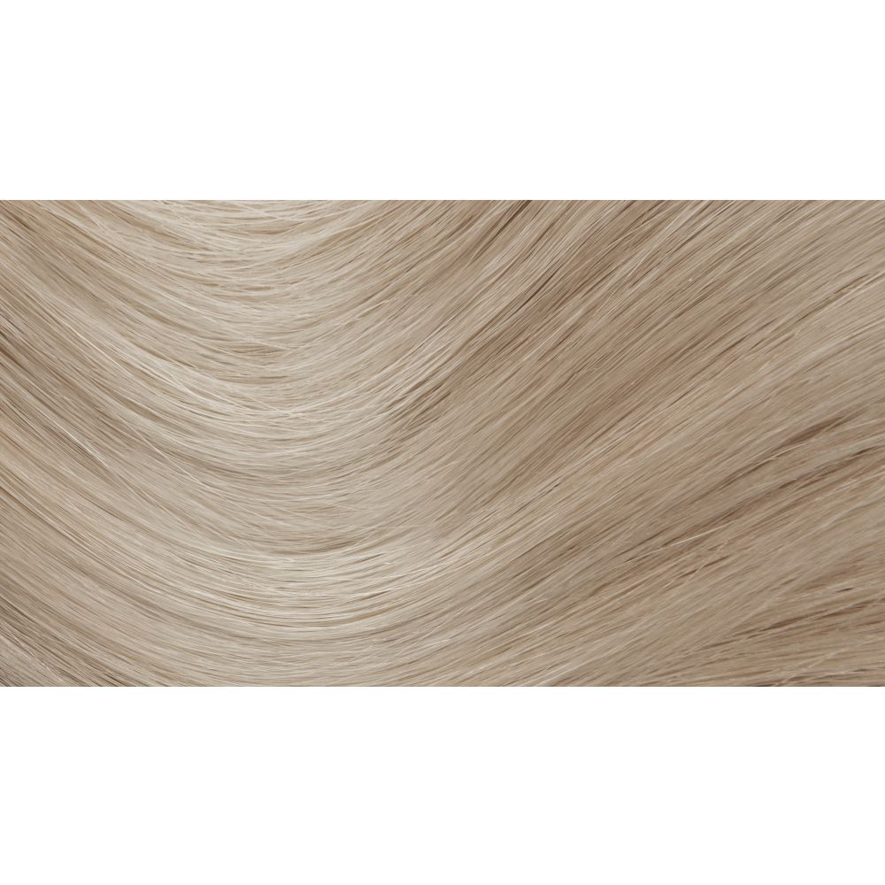 Primo piano di capelli biondi chiari ondulati che mostrano il colore Biondo Sabbia.
