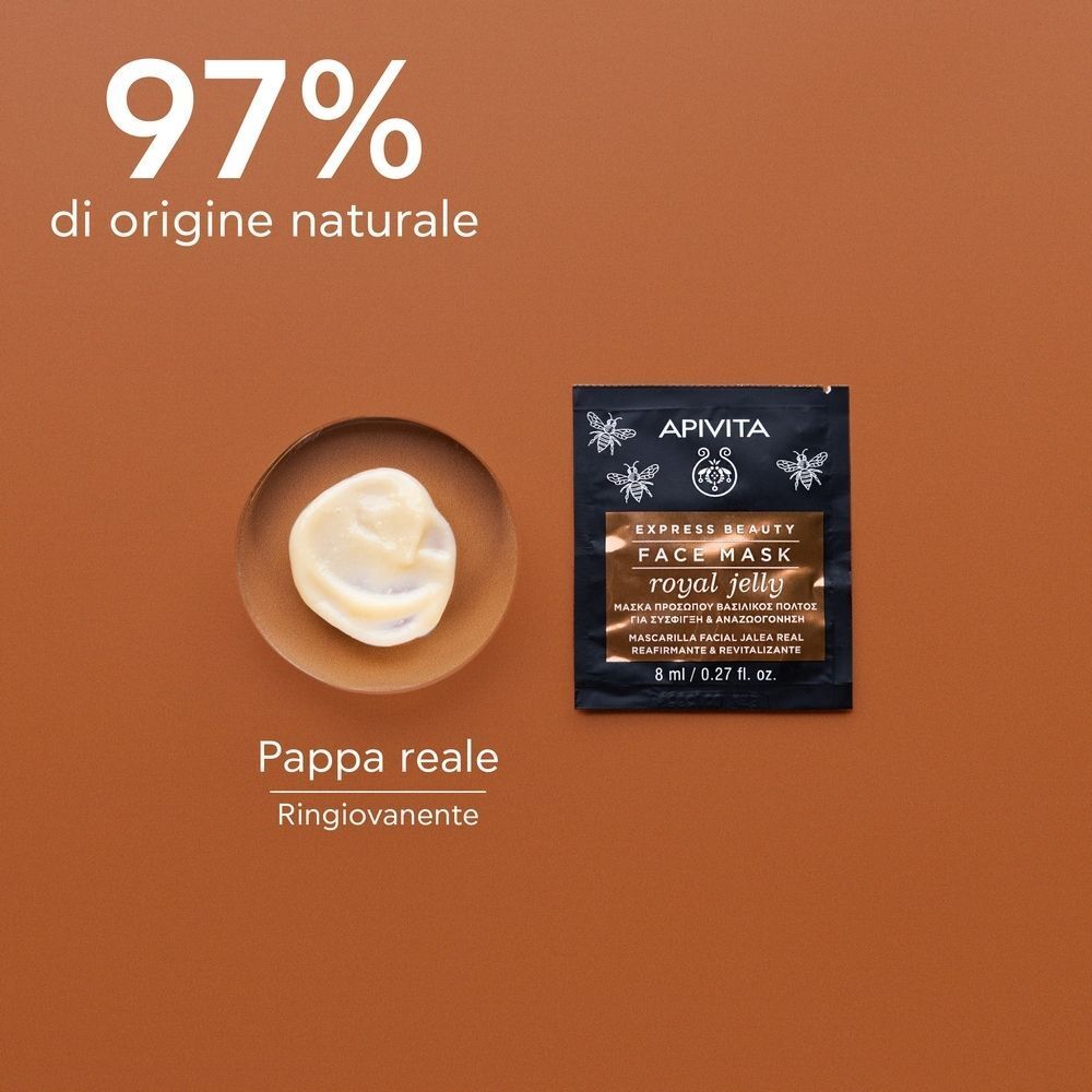Bustina Apivita Royal Jelly Maschera Viso accanto a una ciotola con maschera e testo.