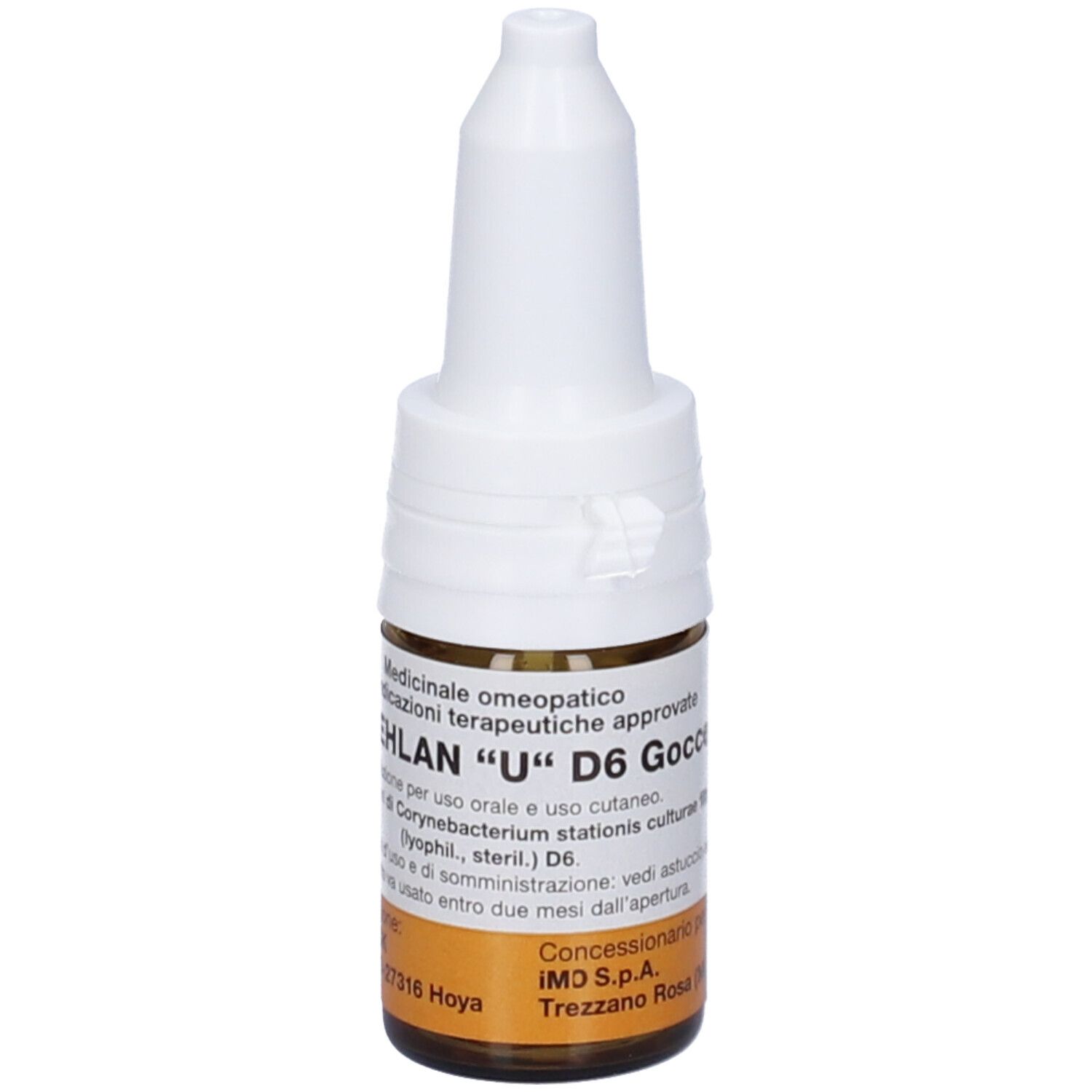 Flacone di vetro marrone con contagocce bianco. Scritta: Arokehlan U D6 Gocce. Etichetta con testo. Produttore: IMD S.p.A.