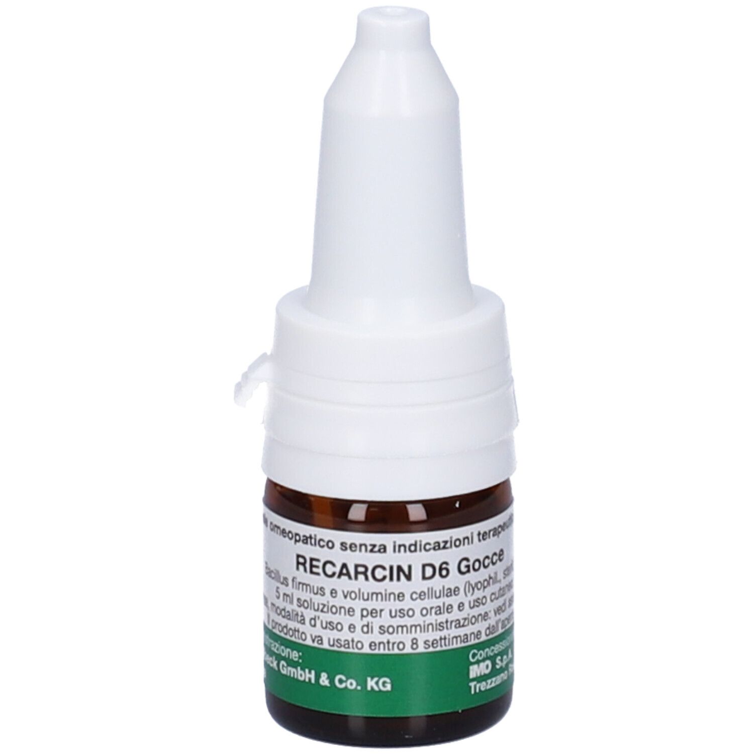 Flacone di vetro marrone con tappo bianco. Scritta: Recarcin D6 Gocce. Produttore: Sanum-Kehlbeck GmbH & Co. KG.