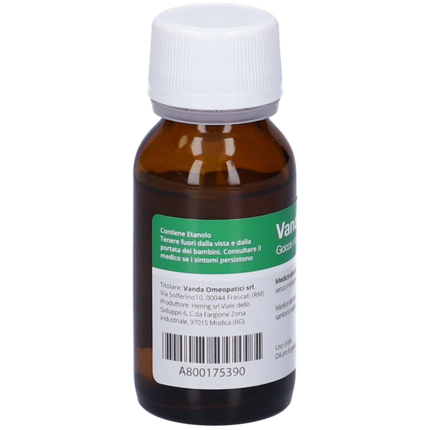 Flacone di vetro marrone con tappo bianco. Etichetta posteriore. Testo: Contiene Etanolo. Indirizzo del produttore e codice a barre.