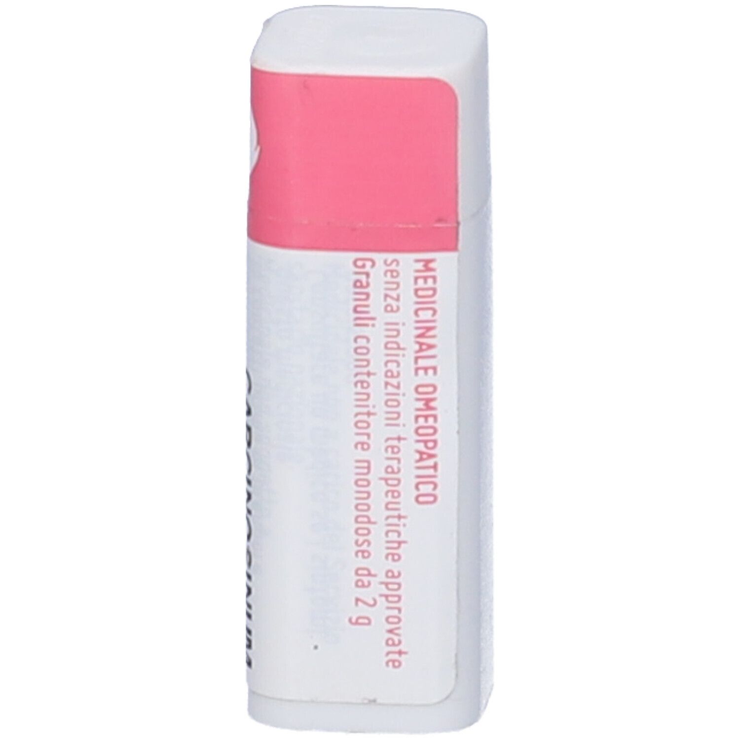 Confezione cilindrica con etichetta rosa. Scritta: Medicinale omeopatico. Contiene granuli.