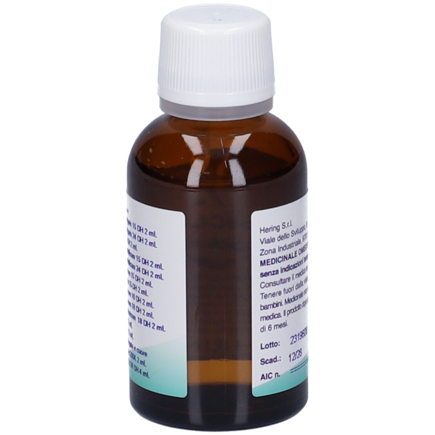 Flacone di vetro marrone con tappo bianco. Scritta: Capsicumplus (Synergipus n. 407). Marchio: HERING.