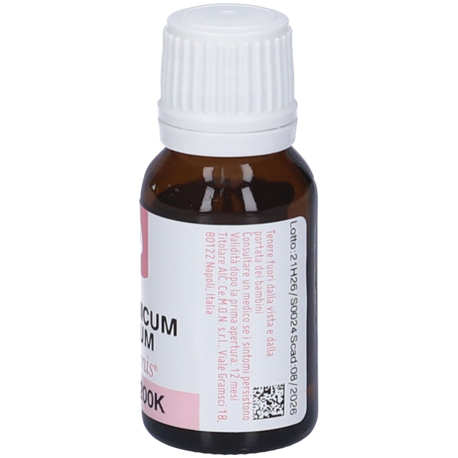 Flacone di vetro marrone con tappo bianco. Etichetta con informazioni sul prodotto e indirizzo. Gocce.