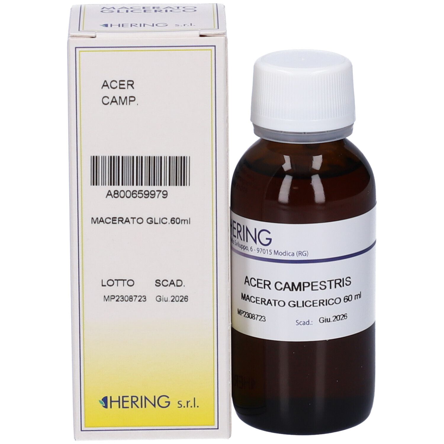 Flacone di vetro marrone e scatola. Sul flacone: etichetta con nome del prodotto. Sulla scatola: nome del prodotto e produttore.
