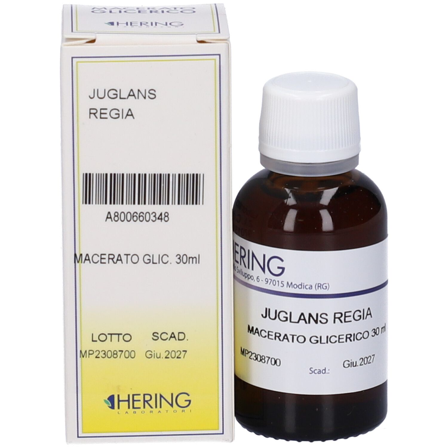 Flacone di vetro marrone con tappo bianco e scatola. Scatola con scritta: Juglans Regia, Macerato Glicerico, 30 ml. Marchio HERING.