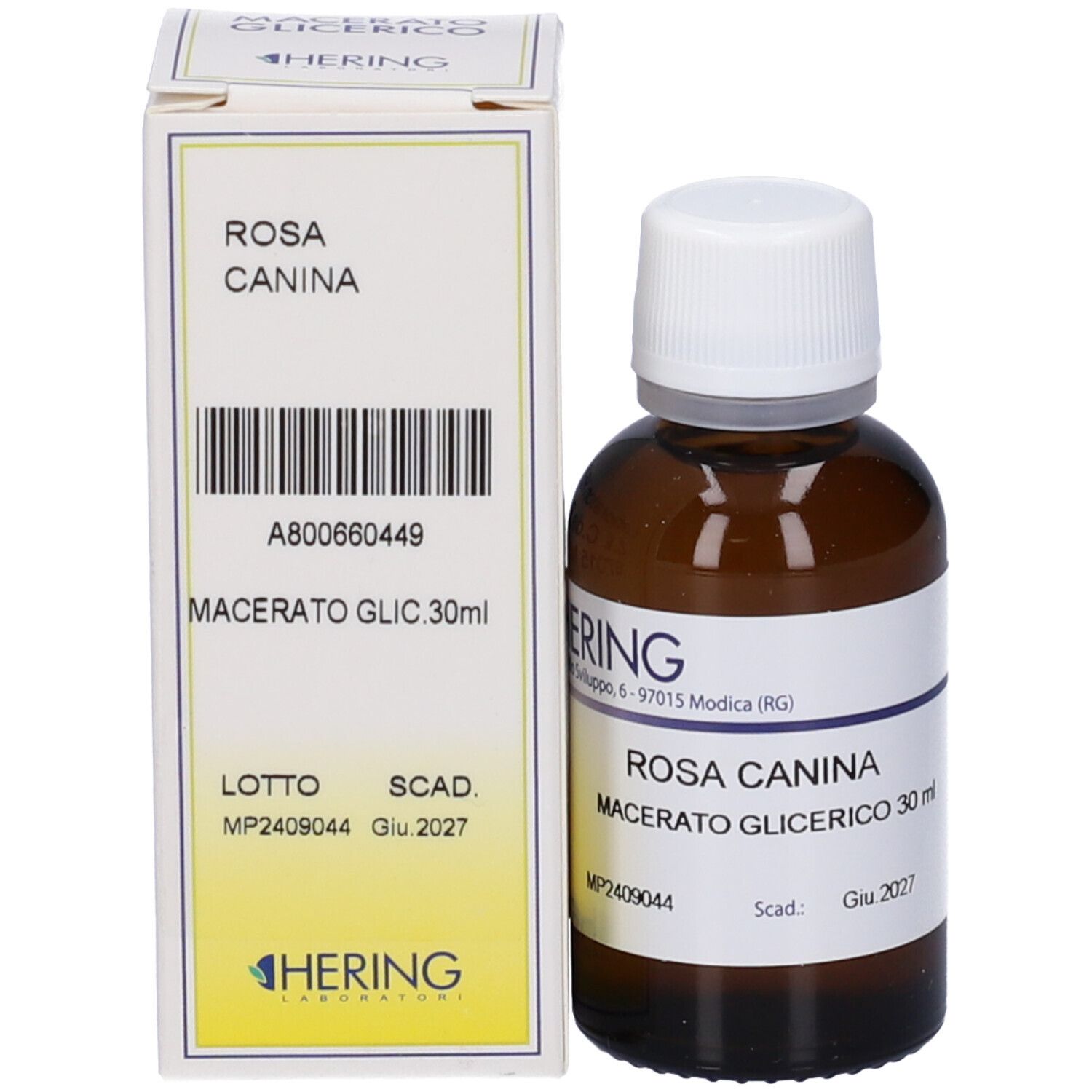 Flacone di vetro marrone e scatola. Scatola con testo: ROSA CANINA Macerato Glic. 30ml. Marchio HERING.