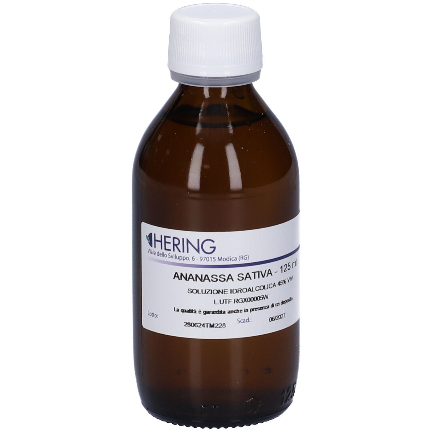 Flacone di vetro marrone con tappo bianco ed etichetta. Scritta: Ananassa Sativa - 125 ml. Marchio: Hering.