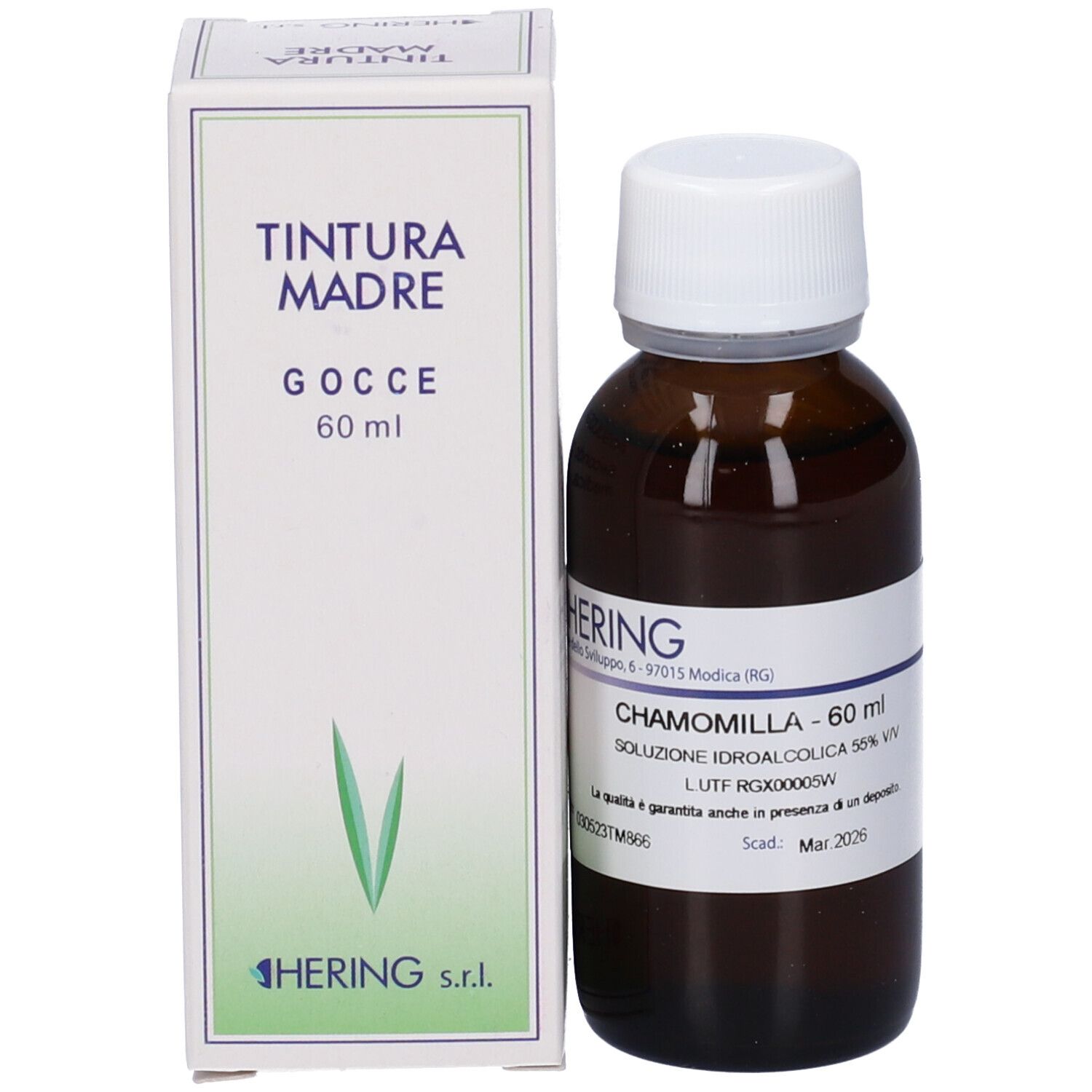 Flacone di vetro marrone con tappo bianco e scatola. Scatola con nome del prodotto e logo. Logo HERING.