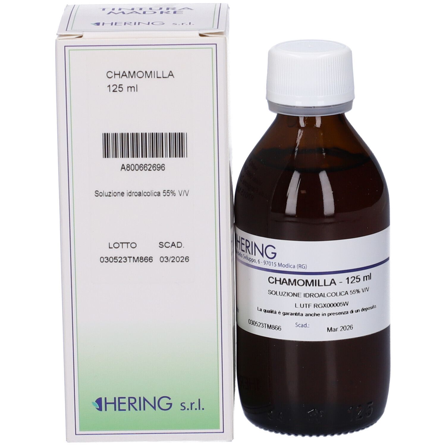 Flacone di vetro marrone e scatola. Scatola con scritta: CHAMOMILLA 125 ml, HERING.
