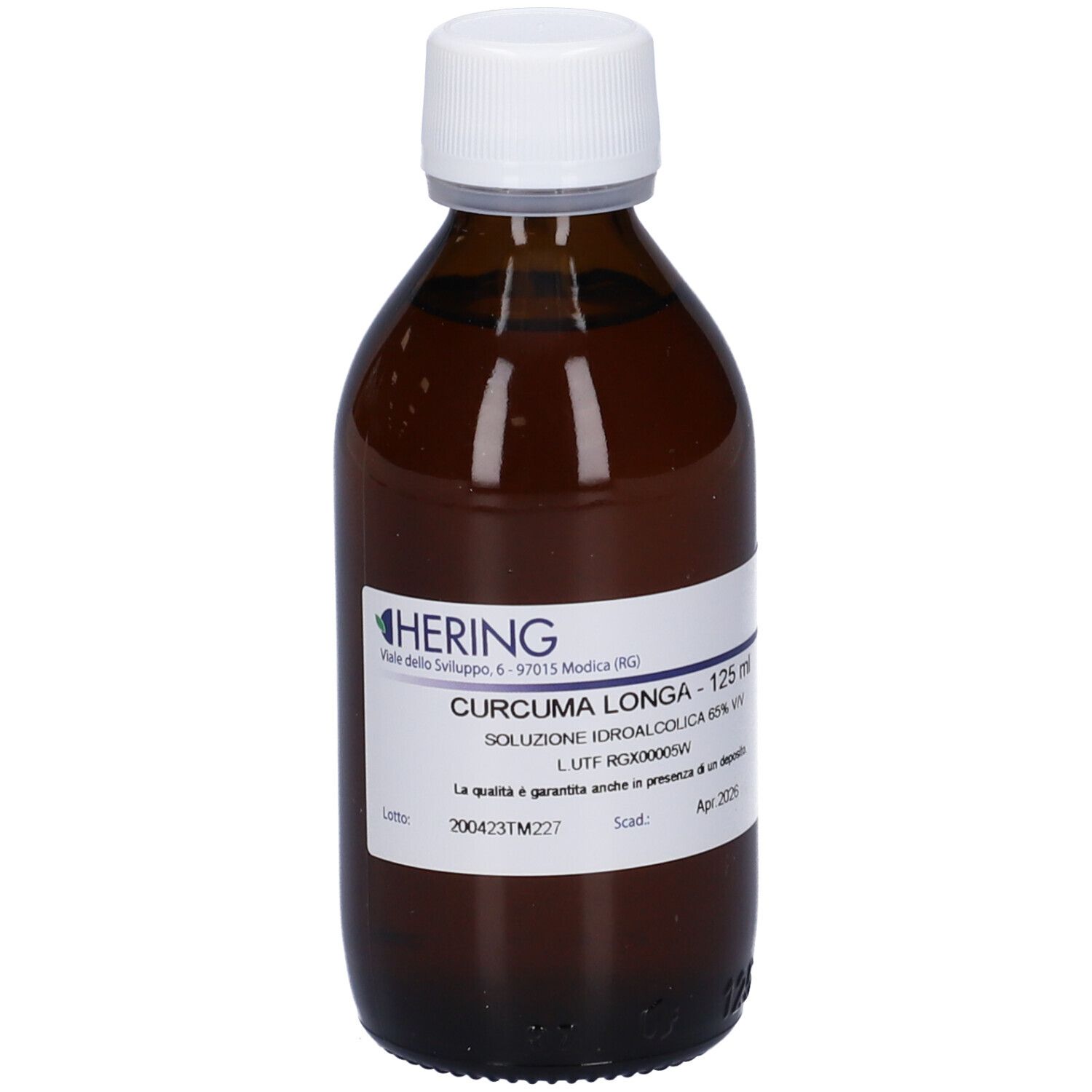 Flacone di vetro marrone con tappo bianco. Etichetta con testo: CURCUMA LONGA, 125 ml, HERING. Soluzione.