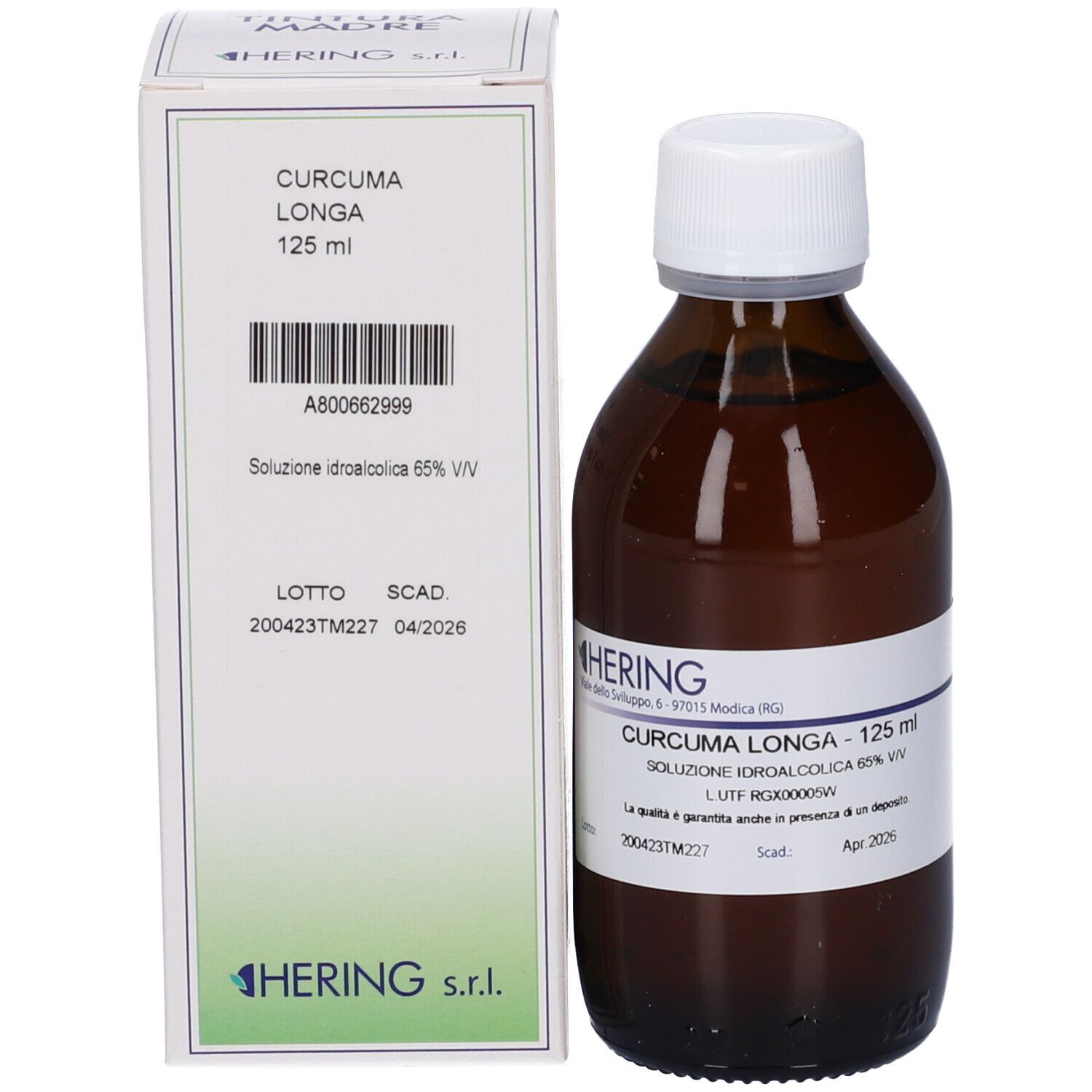 Flacone di vetro marrone e scatola. Scatola con testo: CURCUMA LONGA, 125 ml, HERING. Flacone accanto.